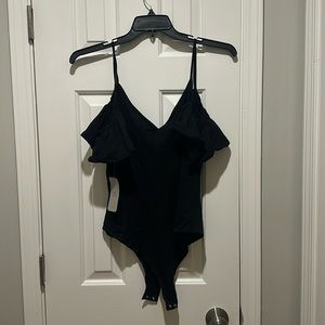 NEW w/tags Black cold shoulder XL body suit with ruffle sleeve